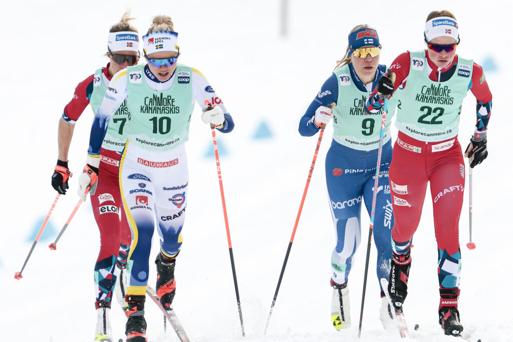 Emma Ribom of Sweden and Mathilde Myhrvold of Norway compete in women's sprint during the FIS Cross-Country World Cup on February 13, 2024 in Canmore.