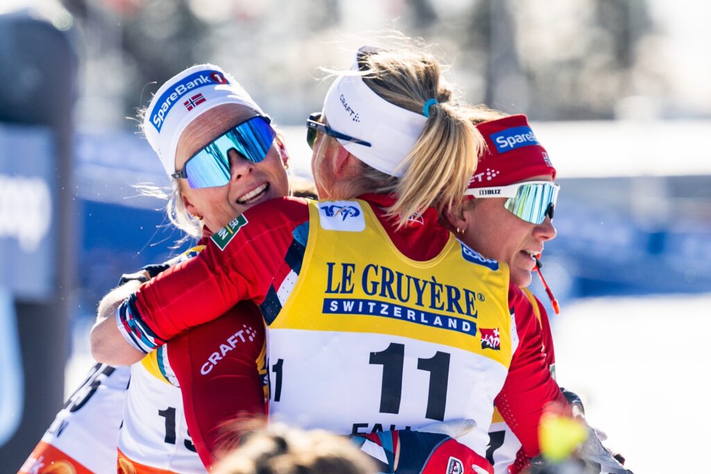 Anne Kjersti Kalvå, Astrid Øyre Slind and Heidi Weng of Norway celebrate after women's 20km mass start during the FIS Cross-Country World Cup on March 17, 2024 in Falun.