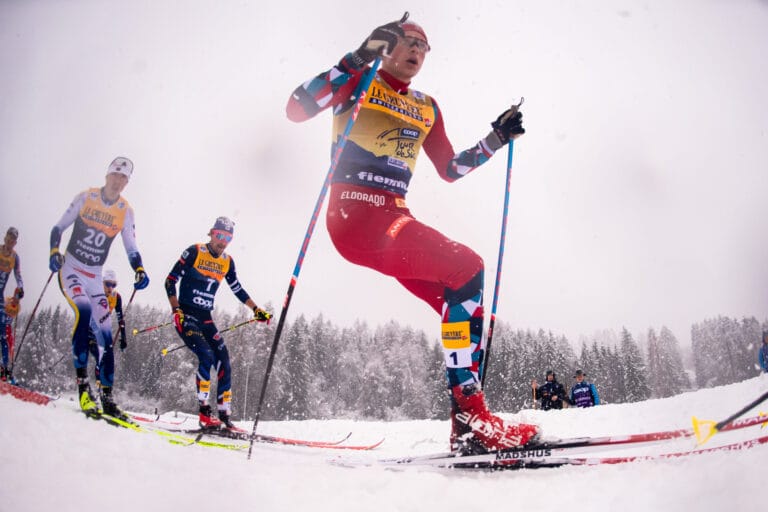 William Poromaa of Sweden, Hugo Lapalus of France and Harald Østberg Amundsen of Norway compete in men's 15 km classic technique mass start during Tour de Ski on January 6, 2024 in Val di Fiemme.