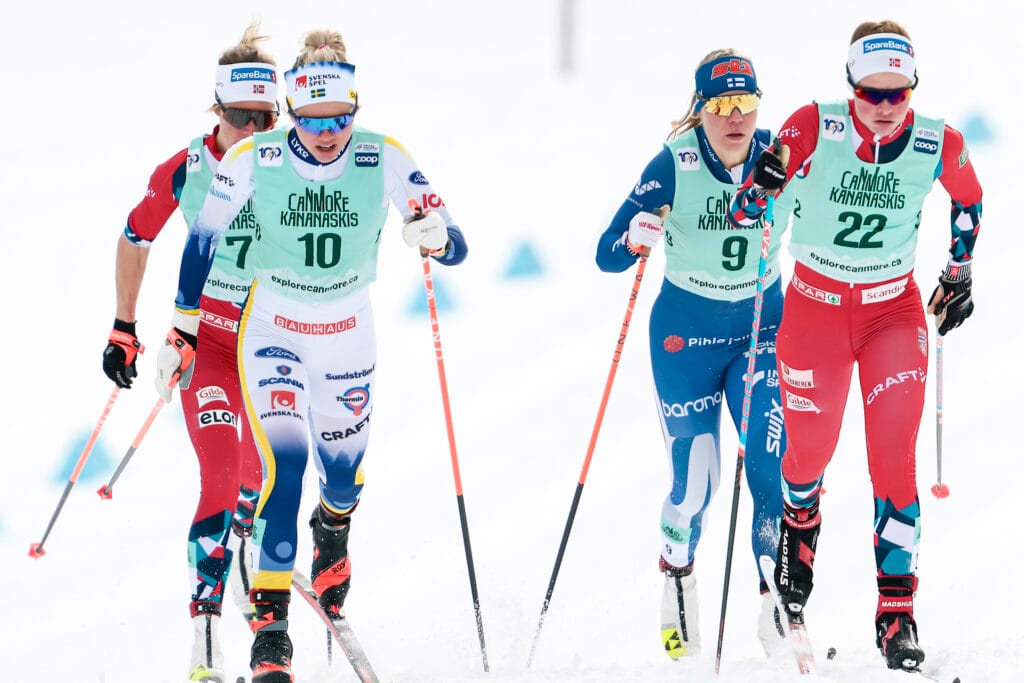 Emma Ribom of Sweden and Mathilde Myhrvold of Norway compete in women's sprint during the FIS Cross-Country World Cup on February 13, 2024 in Canmore.