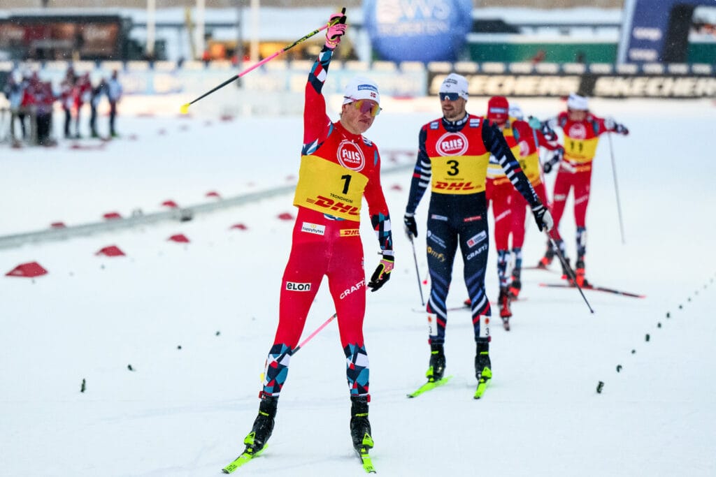 Johannes Høsflot Klæbo of Norway celebrates as he competes in the Men's Cross Country Skiing Sprint final during the FIS Cross-Country World Cup on December 15, 2023 in Trondheim.
