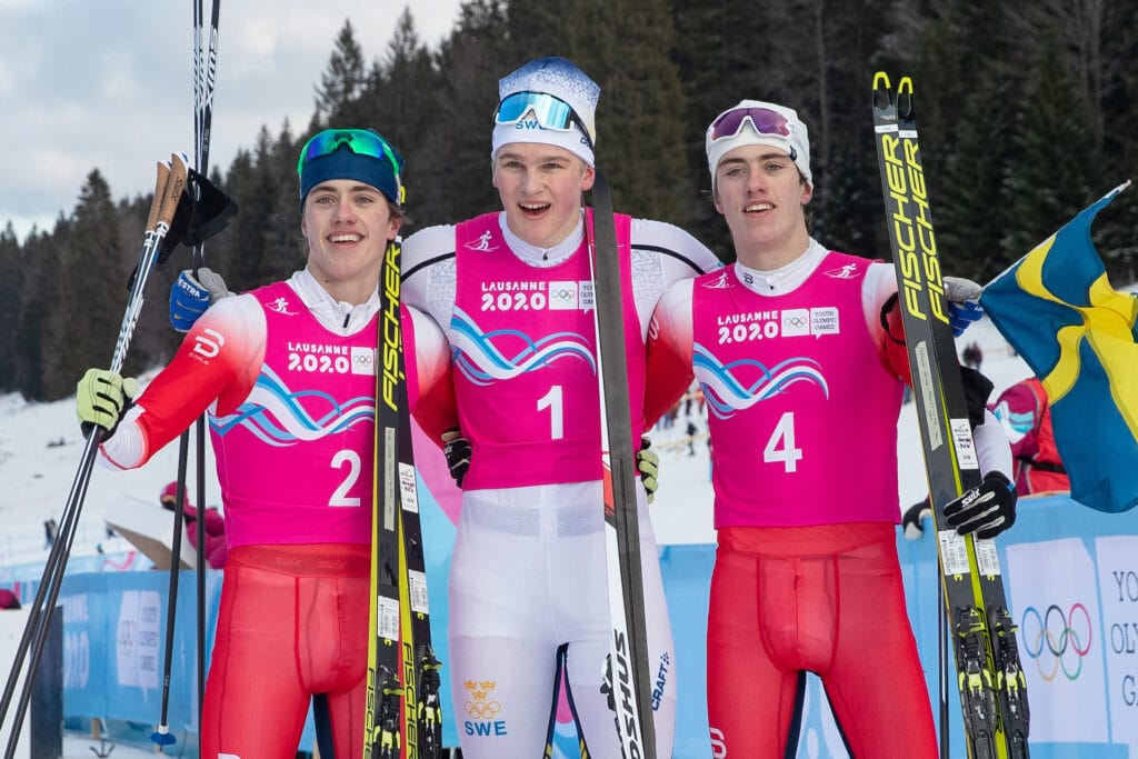Silver medal winner Nikolai Holmboe NOR (left), Gold medal winner Edvin Anger SWE (centre) and Bronze medal winner Aleksander Holmboe NOR (right) after the Cross-Country Skiing Menís Sprint at the Vallee de Joux Cross-Country Centre. The Winter Youth Olympic Games, Lausanne, Switzerland, Sunday 19 January 2020.