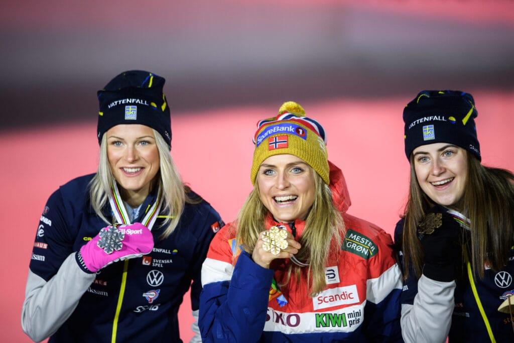 Frida Karlsson of Sweden, Gold medalist Therese Johaug of Norway and and Bronze medalist Ebba Andersson of Sweden at the Medal ceremony for the women's cross-country skiing skiathlon during the FIS Nordic Ski World Championships on February 28, 2021 in Oberstdorf. 