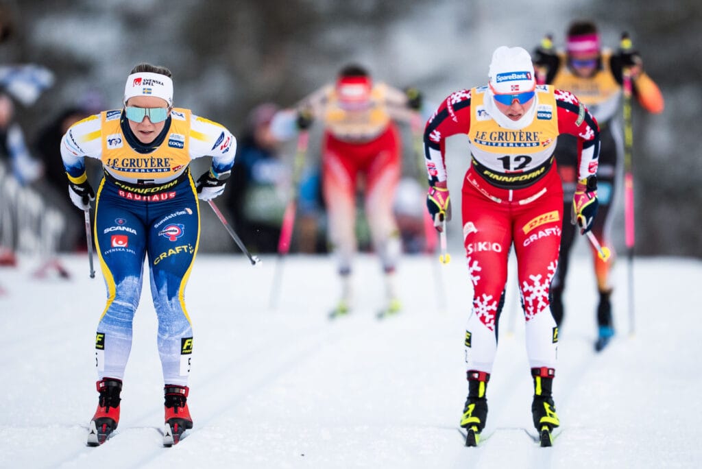 ohanna Hagström of Sweden and Julie Myhre of Norway competes in women's sprint quarter final during the FIS Cross-Country World Cup on November 30, 2024 in Ruka.
