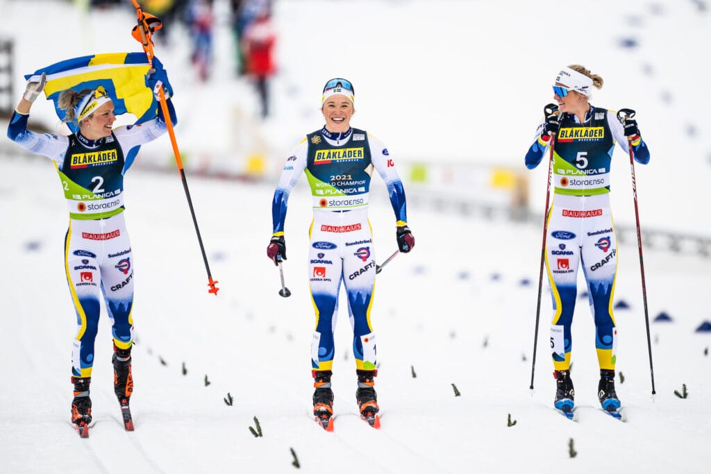 Emma Ribom, Maja Dahlqvist and Jonna Sundling of Sweden celebrates after competing in the Women's Cross Country Skiing Sprint final during the FIS Nordic Ski World Championships on February 23, 2023 in Planica. 
