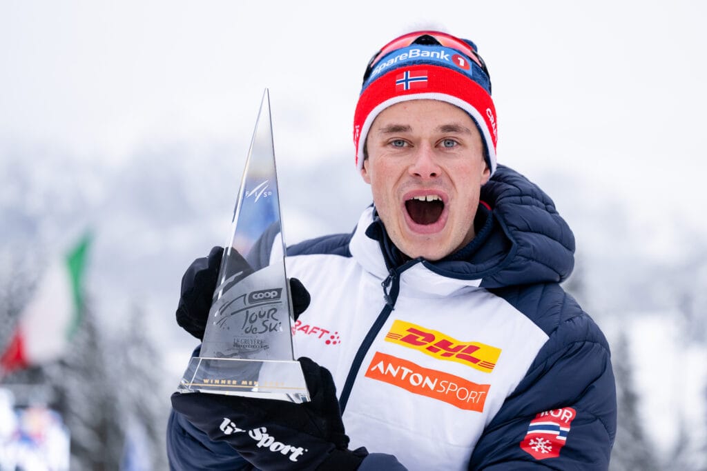 Harald Østberg Amundsen of Norway celebrates with the trophy after competing in men's 10 km free technique mass start during Tour de Ski on January 7, 2024 in Val di Fiemme.