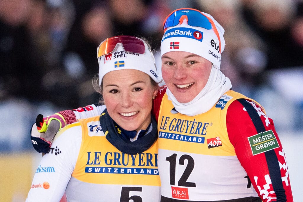 Johanna Hagström of Sweden and Julie Myhre of Norway celebrate after competing in women's sprint final during the FIS Cross-Country World Cup on November 30, 2024 in Ruka.
