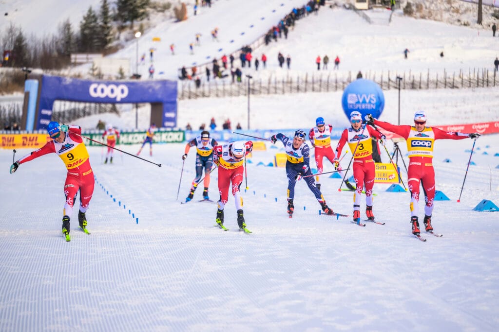 Jan Thomas Jenssen of Norway, Martin Løwstrøm Nyenget of Norway, Simen Hegstad Krueger of Norway and Harald Østberg Amundsen of Norway crosses the Finnish line in the men's cross country skiing skiathlon during the FIS Cross-Country World Cup on December 8, 2024 in Lillehammer.