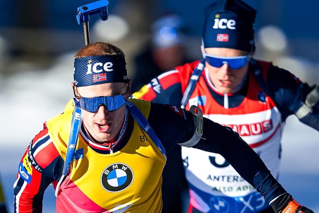Johannes Thingnes Boe (NOR), Martin Uldal (NOR), (l-r) - IBU World Cup Biathlon, sprint men, Antholz (ITA). www.nordicfocus.com.