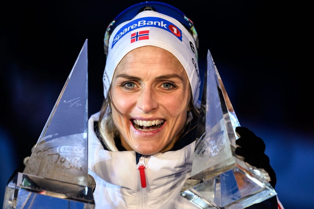 Therese Johaug of Norway poses for a portrait with the trophies after day nine of Tour de Ski on January 5, 2025 in Tesero.