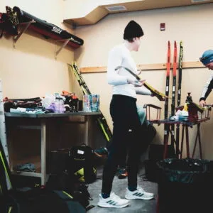 Alvar Johannes Alev (EST) and his teammate working and waxing their own skis as they compete without wax technicians - FIS world cup cross-country, training, Canmore (CAN). www.nordicfocus.com. © Modica/NordicFocus.