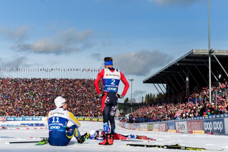 William Poromaa of Sweden, Simen Hegstad Krüger of Norway and Harald Østberg Amundsen of Norway after the men's free technique 50 km mass start during day 11 of the 2025 FIS Nordic Ski World Championships on March 8, 2025 in Trondheim.
