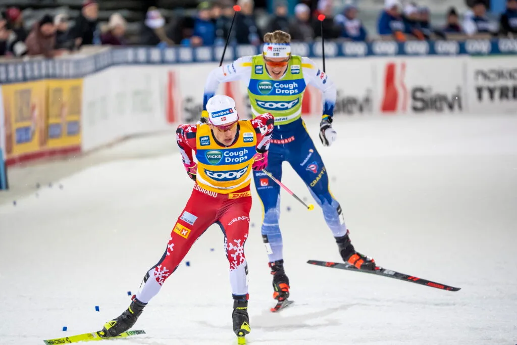 Johannes Høsflot Klæbo of Norway and Edvin Anger of Sweden after the Men's Sprint semi final during the FIS Cross-Country World Cup on March 21, 2025 in Lahti.