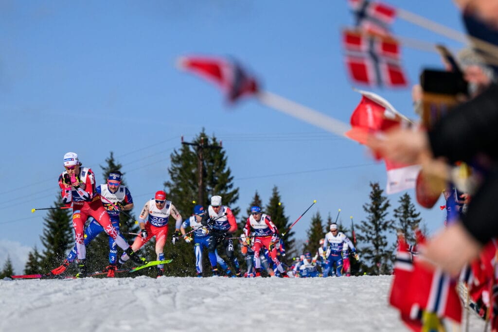 Johannes Høsflot Klæbo of Norway and Hugo Lapalus of France competes in the men's free technique 50 km mass start during day 11 of the 2025 FIS Nordic Ski World Championships on March 8, 2025 in Trondheim.