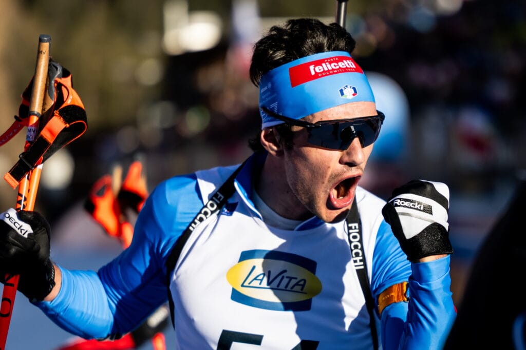 Tommaso Giacomel of Italy celebrates after men's 20 km individual during the IBU Biathlon World Championships on February 19, 2025 in Lenzerheide.