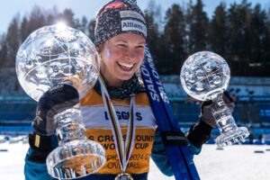 250323 Jessie Diggins of United States celebrates winning the women’s Distance World Cup and the overall women’s World Cup after the women's classic technique 50 km mass start during the FIS Cross-Country World Cup on March 23, 2025 in Lahtis.