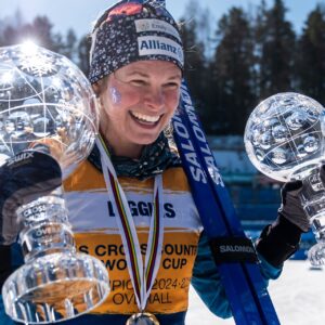 250323 Jessie Diggins of United States celebrates winning the women’s Distance World Cup and the overall women’s World Cup after the women's classic technique 50 km mass start during the FIS Cross-Country World Cup on March 23, 2025 in Lahtis.