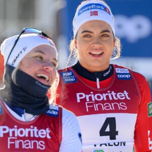 Linn Svahn of Sweden and Kristine Stavås Skistad of Norway celebrate after the Women's Sprint final during the FIS Cross-Country World Cup on February 14, 2025 in Falun.