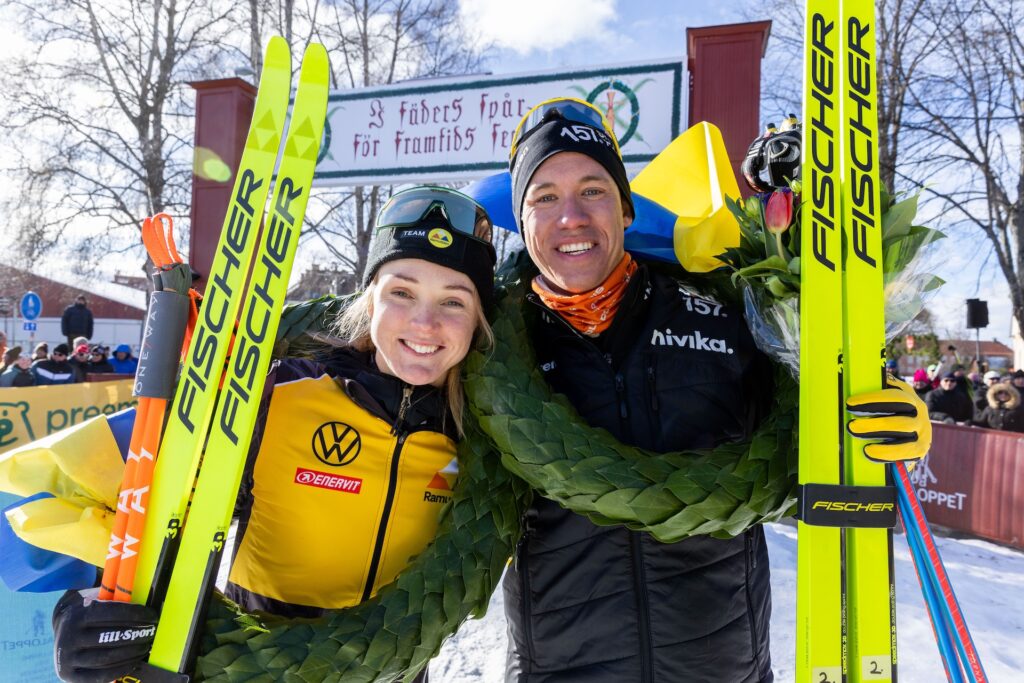 Emelie Fleten and Emil Persson celebrate after Vasaloppet on March 5, 2023 in Mora.