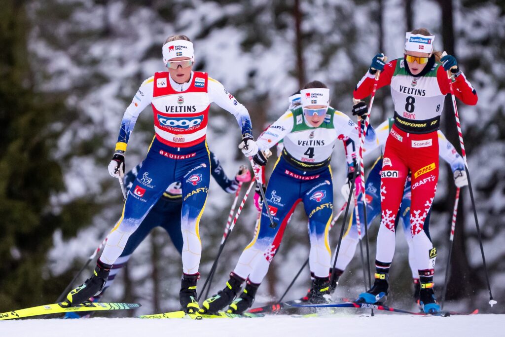 Frida Karlsson of Sweden, Ebba Andersson of Sweden and Karoline Simpson-Larsen of Norway competes in the FIS Cross-Country World Cup Women's Mass Start 20.0 km Free on November 30, 2025 in Ruka.