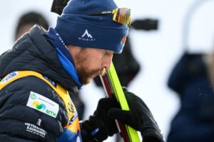 Perttu Hyvarinen of Finland after with his phone after men's cross country skiing 10 km classic technique interval start during Tour de Ski on December 31, 2023 in Toblach.